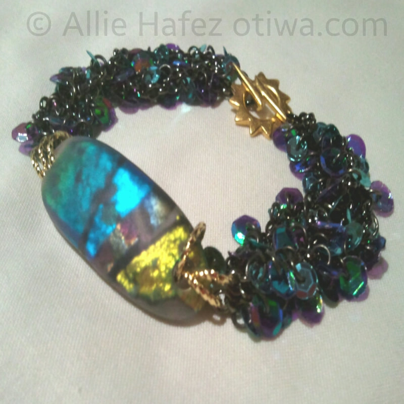 Image of fused glass, chain and sequins bracelet